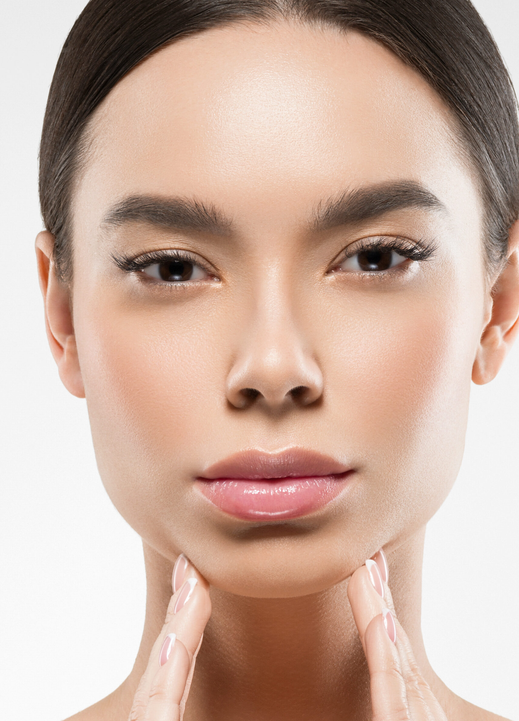 Woman with beautifully contoured chin and jawline at Couture Dermatology Beverly Hills