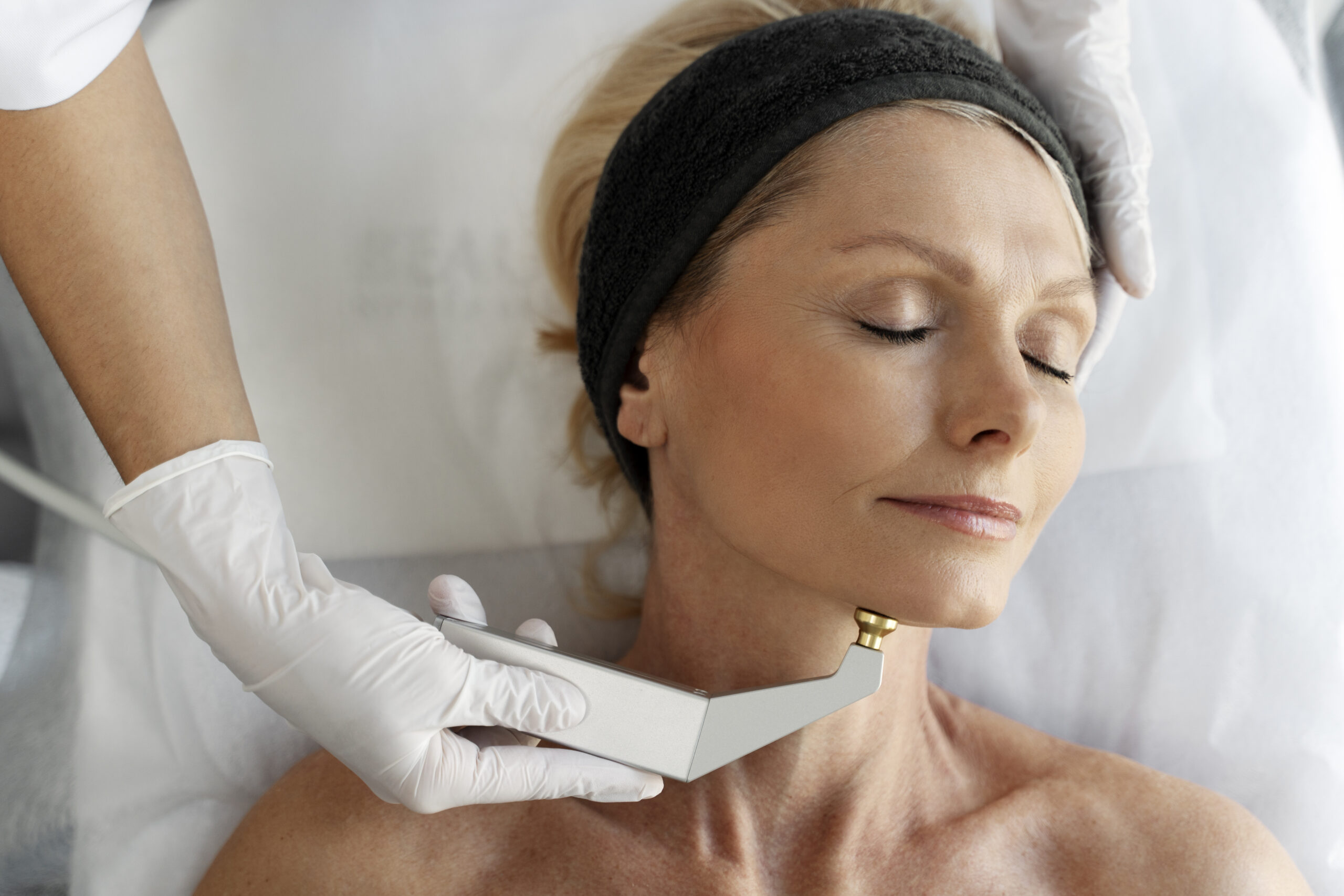 Close-up of woman with smooth, firm neck after Neck Contouring treatment at Couture Dermatology Beverly Hills