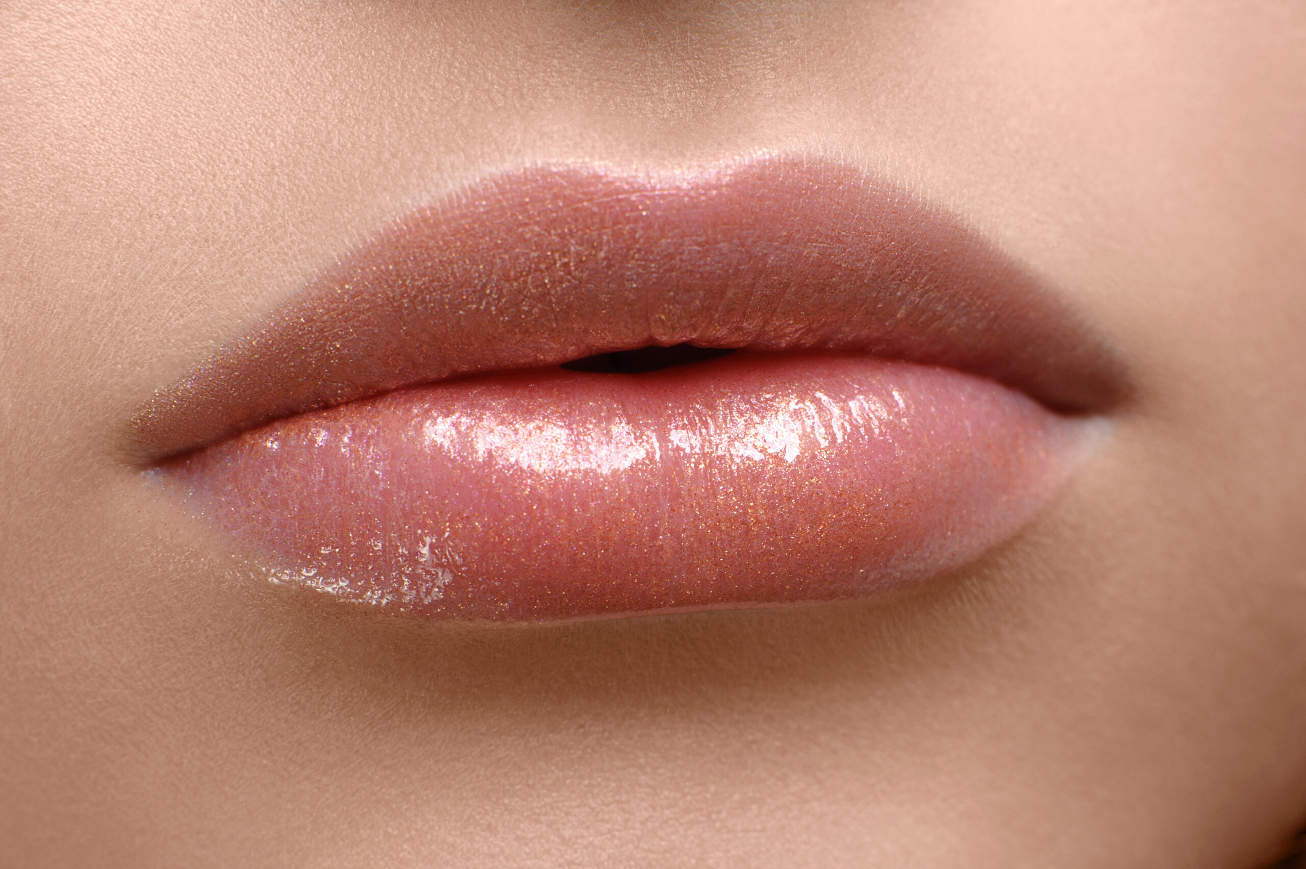 Close-up of red lips after lip enhancement filler at Couture Dermatology